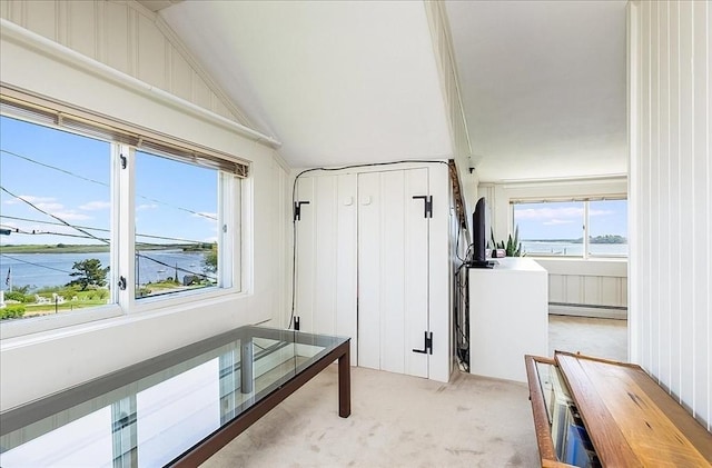 113 N Ridge Rd, Ipswich, MA 01938 - unfurnished sunroom featuring baseboard heating, a water view, and lofted ceiling