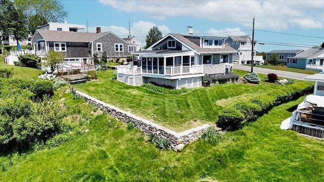 113 N Ridge Rd, Ipswich, MA 01938 - back of house with a sunroom and a yard