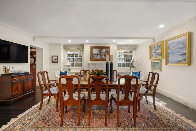 dining room with recessed lighting, dark wood-type flooring, baseboards, and ornamental molding