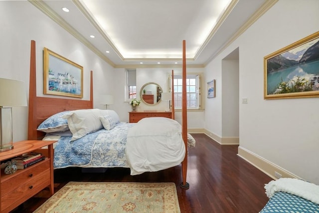 bedroom with wood finished floors, baseboards, recessed lighting, ornamental molding, and a raised ceiling