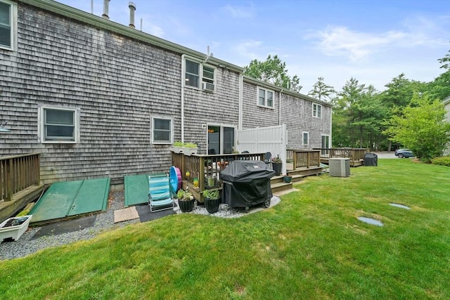 547 Washington St Unit B13, Pembroke, MA 02359 - back of property with a lawn and a deck