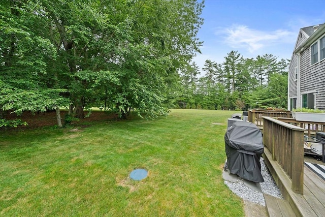 547 Washington St Unit B13, Pembroke, MA 02359 - view of green lawn with a wooden deck