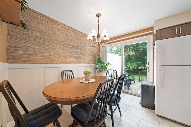 547 Washington St Unit B13, Pembroke, MA 02359 - dining room with a chandelier and a wainscoted wall