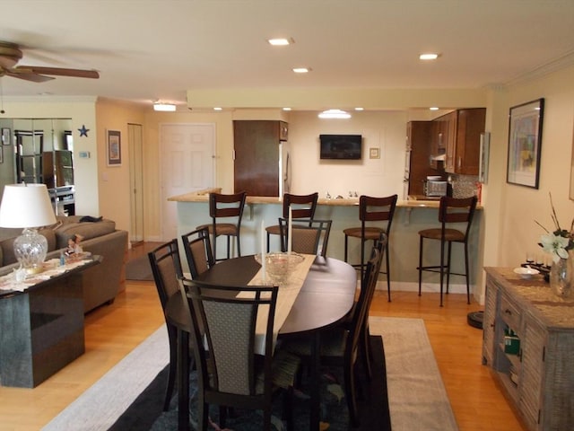 154 Lynnway Unit 309, Lynn, MA 01902 - dining space with light wood finished floors, ceiling fan, crown molding, and recessed lighting