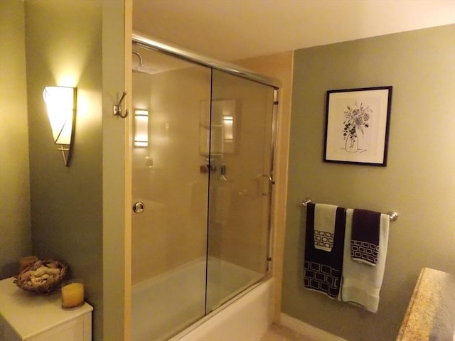 154 Lynnway Unit 309, Lynn, MA 01902 - bathroom featuring shower / bath combination with glass door