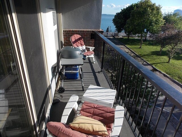 154 Lynnway Unit 309, Lynn, MA 01902 - balcony featuring a water view and a grill