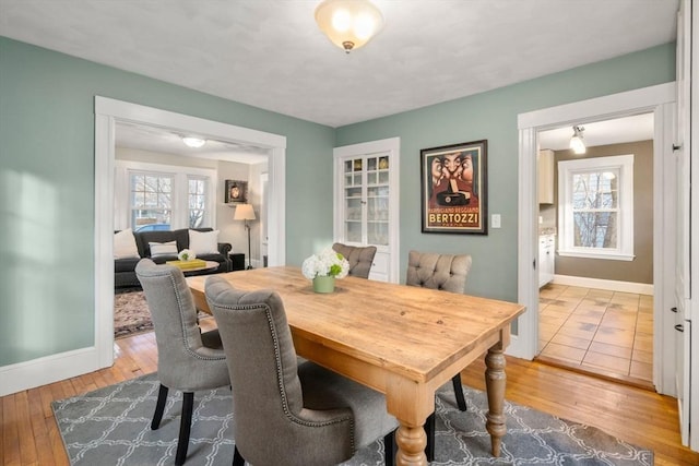 dining space featuring hardwood / wood-style floors