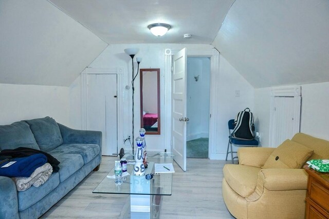 82 Jefferson Ave, Everett, MA 02149 - living room featuring light wood-style flooring and vaulted ceiling