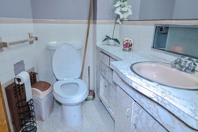 82 Jefferson Ave, Everett, MA 02149 - half bath featuring tile walls, vanity, and toilet