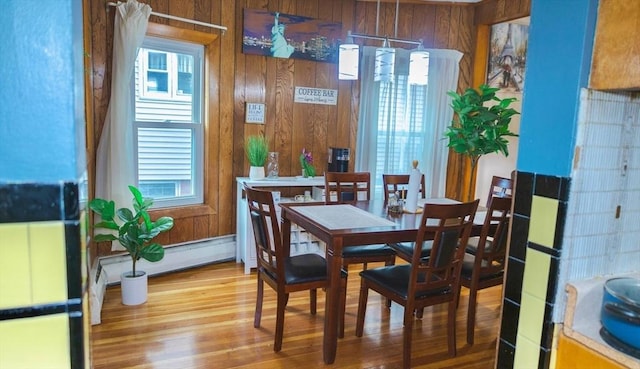 82 Jefferson Ave, Everett, MA 02149 - dining room with wooden walls and light wood-style flooring