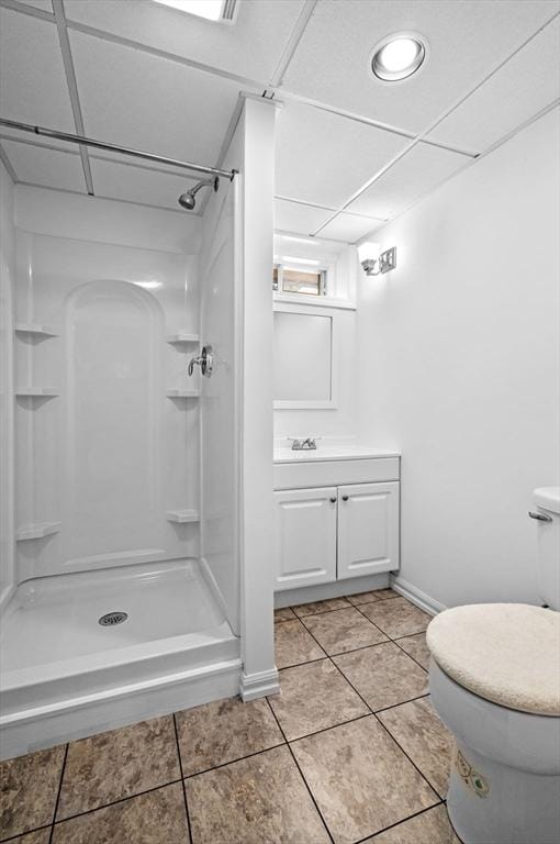 26 Harvest Rd, Reading, MA 01867 - bathroom with a shower stall, vanity, and tile patterned floors