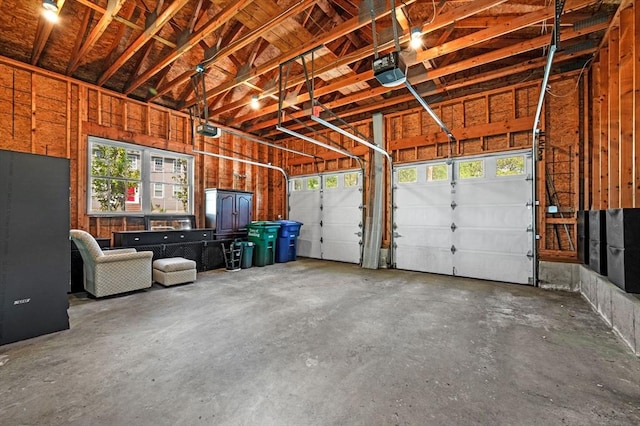 26 Harvest Rd, Reading, MA 01867 - garage featuring a garage door opener
