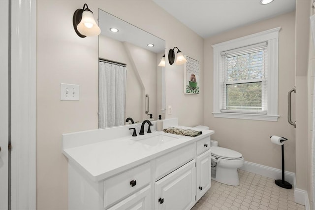 bathroom with toilet, baseboards, recessed lighting, vanity, and tile patterned flooring