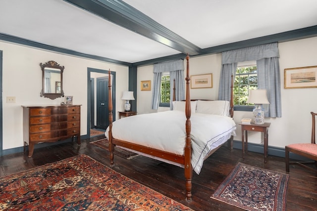 bedroom featuring hardwood / wood-style floors, a baseboard radiator, and ornamental molding