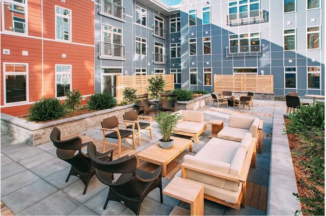 view of patio featuring an outdoor living space and outdoor dining area