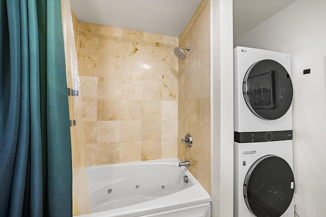 1313 Washington St Unit 309, Boston, MA 02118 - full bath featuring stacked washing machine and dryer and a combined bath / shower with jetted tub