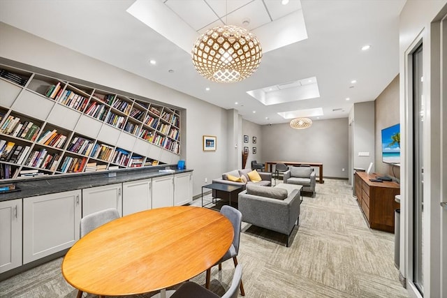 1313 Washington St Unit 309, Boston, MA 02118 - dining area with a raised ceiling, light carpet, a skylight, and recessed lighting