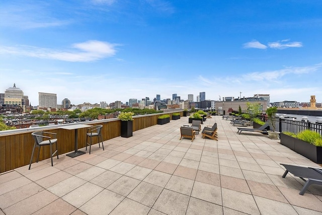 1313 Washington St Unit 309, Boston, MA 02118 - view of patio featuring a skyline view