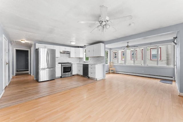 59 Harvard St, Everett, MA 02149 - kitchen featuring appliances with stainless steel finishes, ceiling fan, a baseboard radiator, light countertops, and light wood finished floors