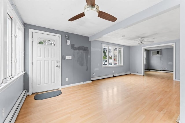 59 Harvard St, Everett, MA 02149 - foyer featuring a baseboard heating unit and ceiling fan