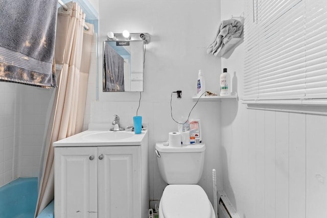 59 Harvard St, Everett, MA 02149 - full bathroom with toilet, vanity, a baseboard radiator, and shower / bath combo with shower curtain