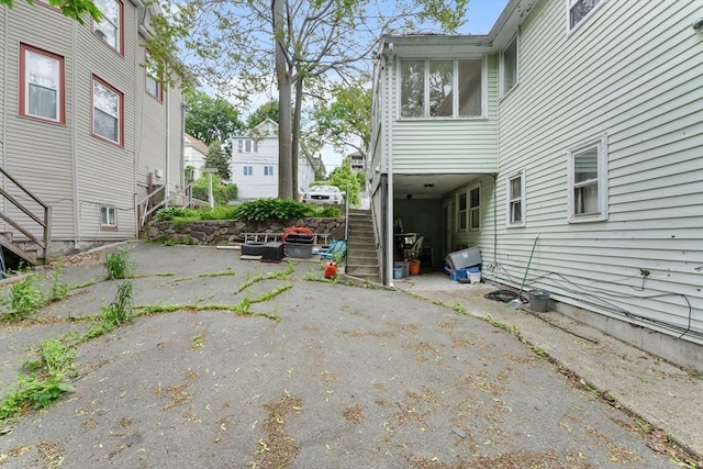 59 Harvard St, Everett, MA 02149 - view of parking featuring stairway