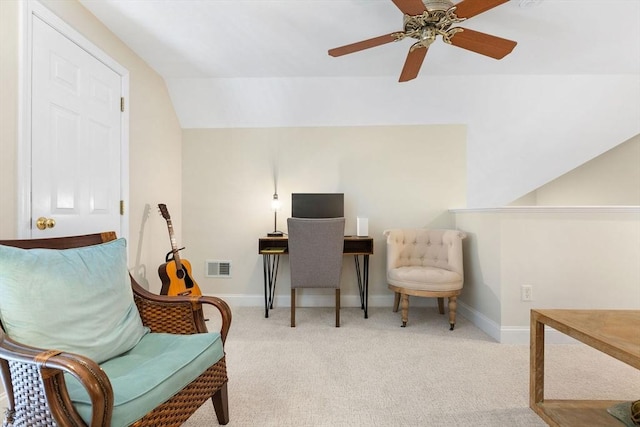 home office featuring lofted ceiling, carpet flooring, baseboards, and visible vents