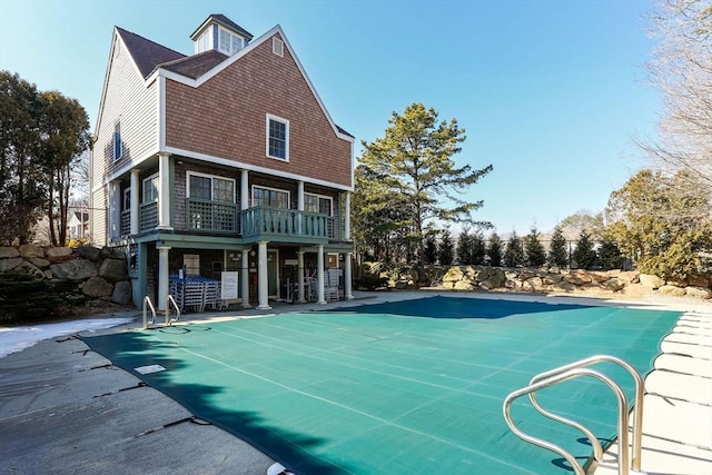 view of pool featuring a fenced in pool and a patio