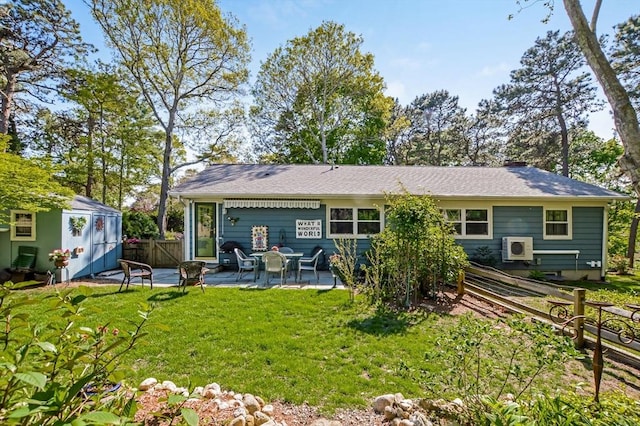 rear view of house featuring a patio area