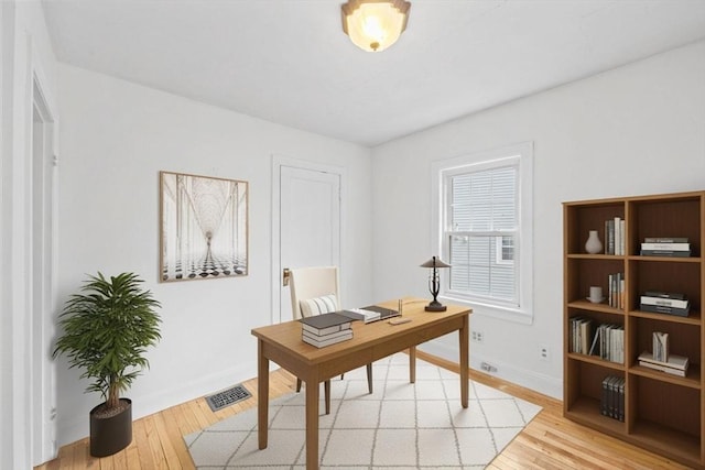 94 Clinton Rd, Weymouth, MA 02189 - home office featuring light wood finished floors and baseboards
