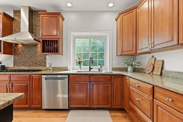 45 Anselm Way, Sudbury, MA 01776 - kitchen featuring stainless steel dishwasher, wall chimney exhaust hood, a sink, light wood-style flooring, and gas stovetop