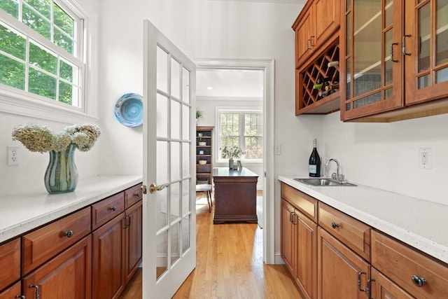 45 Anselm Way, Sudbury, MA 01776 - indoor bar with french doors and light wood-type flooring