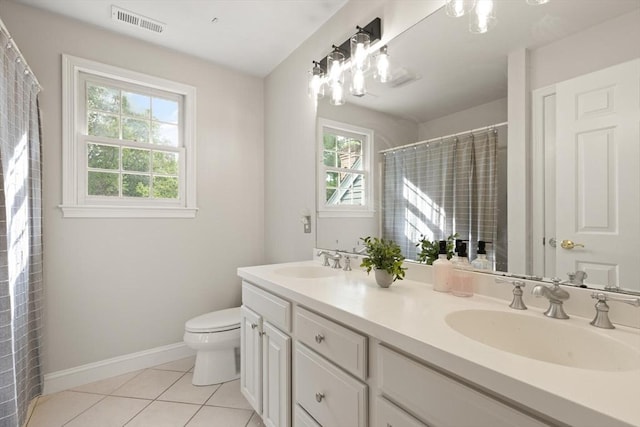 45 Anselm Way, Sudbury, MA 01776 - bathroom with double vanity, toilet, tile patterned flooring, baseboards, and a shower with curtain