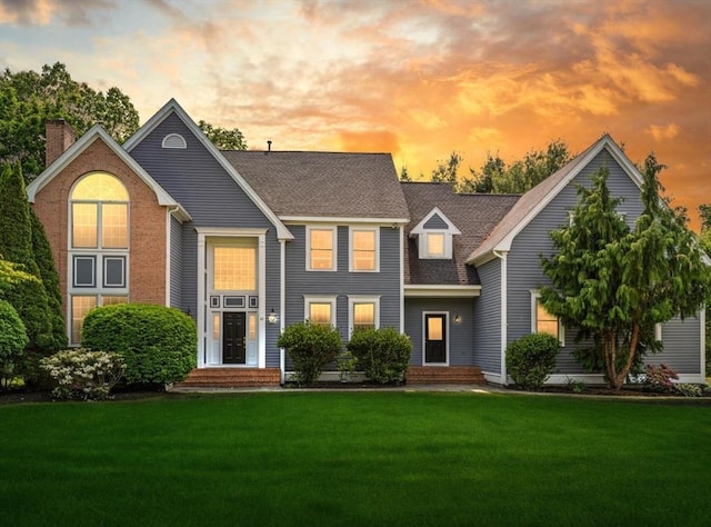 45 Anselm Way, Sudbury, MA 01776 - view of front facade with a front lawn, a chimney, and roof with shingles