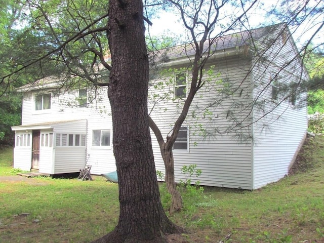 471 Mechanic St, Fitchburg, MA 01420 - view of side of home featuring a lawn