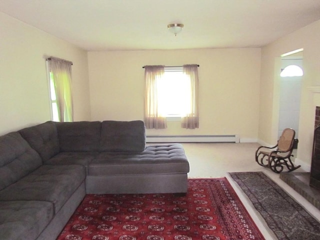 471 Mechanic St, Fitchburg, MA 01420 - carpeted living room with a baseboard heating unit and a fireplace with raised hearth