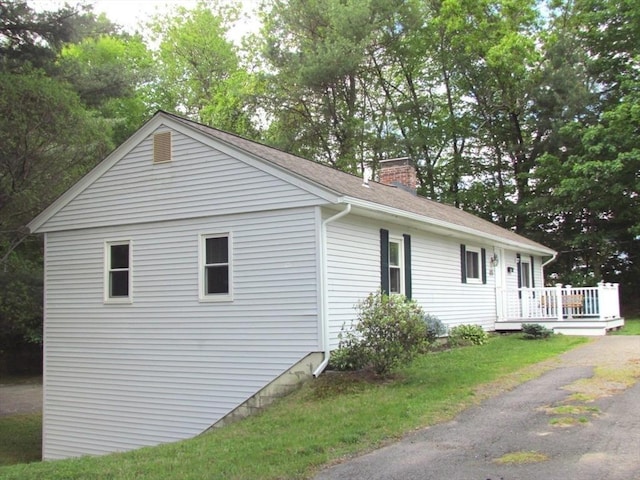 471 Mechanic St, Fitchburg, MA 01420 - view of side of property featuring a chimney and a shingled roof