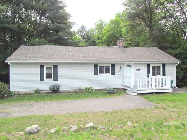 471 Mechanic St, Fitchburg, MA 01420 - single story home with a chimney, a front yard, a shingled roof, and a wooden deck
