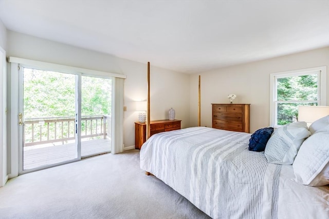 18 Curve Hill Rd, Yarmouth, MA 02664 - bedroom featuring access to exterior, multiple windows, and light colored carpet