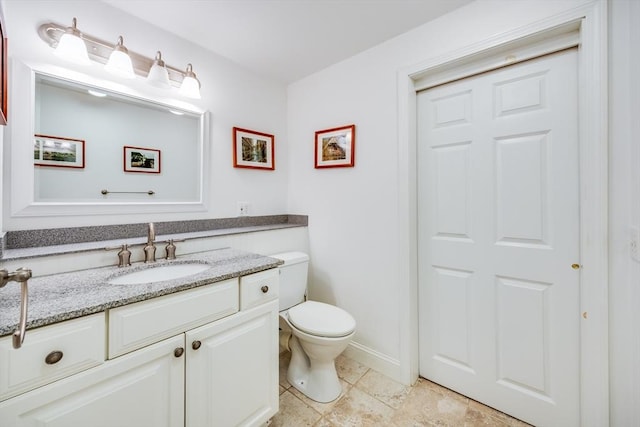 18 Curve Hill Rd, Yarmouth, MA 02664 - half bathroom with vanity, toilet, tile patterned flooring, and baseboards
