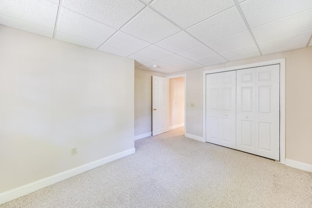18 Curve Hill Rd, Yarmouth, MA 02664 - unfurnished bedroom featuring carpet floors, a drop ceiling, baseboards, and a closet