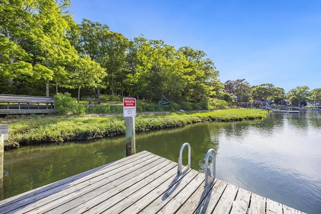 18 Curve Hill Rd, Yarmouth, MA 02664 - dock with a water view and view of scattered trees