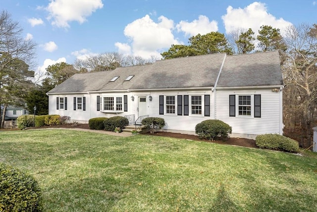 18 Curve Hill Rd, Yarmouth, MA 02664 - back of house featuring a lawn and a shingled roof