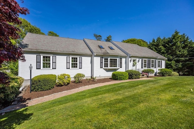 18 Curve Hill Rd, Yarmouth, MA 02664 - view of front of house featuring a front yard