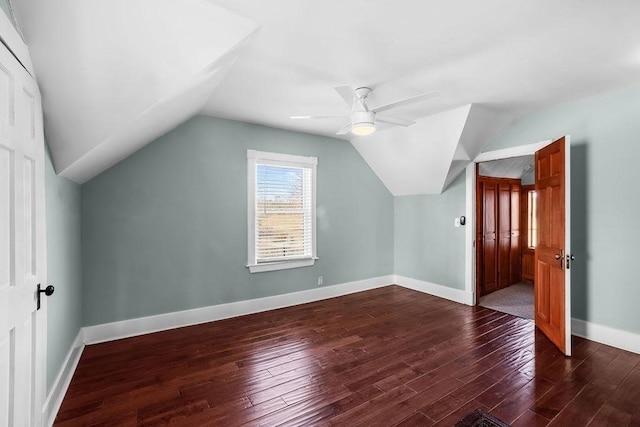 bonus room featuring vaulted ceiling, ceiling fan, and dark hardwood / wood-style floors