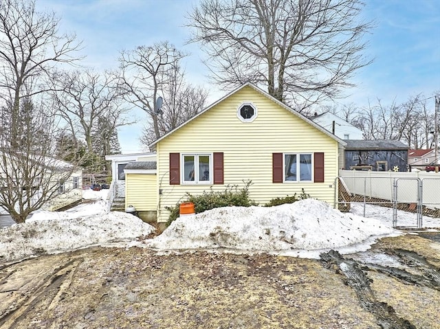 view of front of property with fence