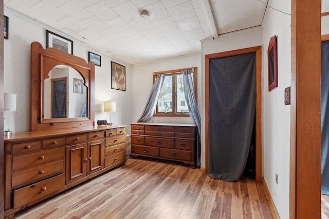 bedroom with light wood-style floors