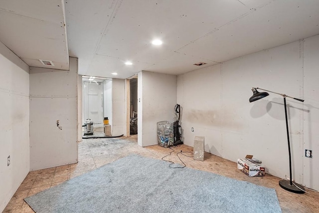 unfinished basement with visible vents