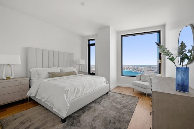 bedroom with wood-type flooring