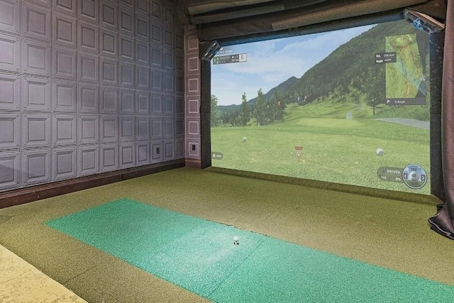 playroom featuring golf simulator and a mountain view